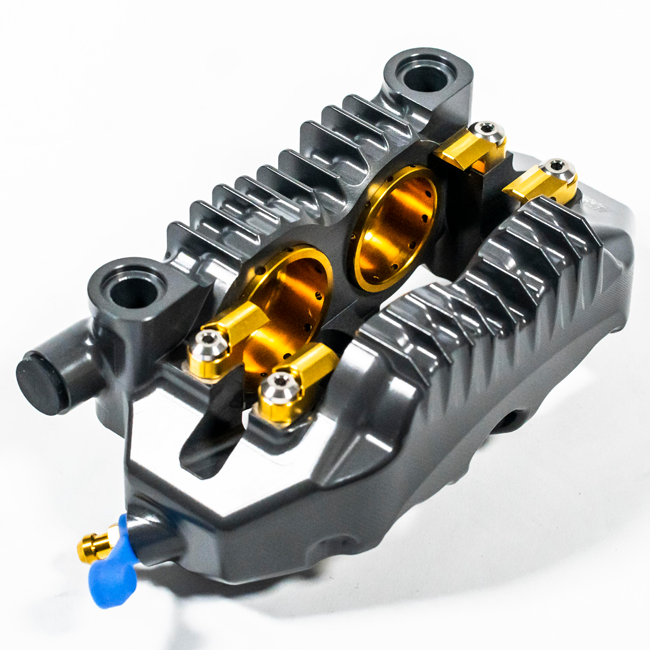 TASLOS X75 SBK Racing Monoblock P4 32/36 100 mm per le pinze freno anteriore a sinistra | X75.100.hd.l